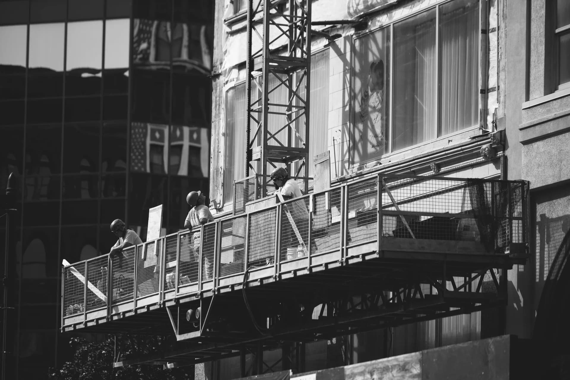 Construction workers on scaffolding